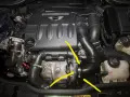 Motore Mini Cooper con evidenziata una possibile perdita olio motore lato destro, vicino al turbo.