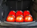 Bagagliaio con bombole GPL rosse. Informazioni su euro 4 GPL fino a quando possono circolare.