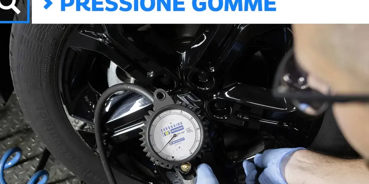 Controllo pressione gomme auto con manometro. Assicurati di gonfiare le gomme alla giusta pressione per la sicurezza.