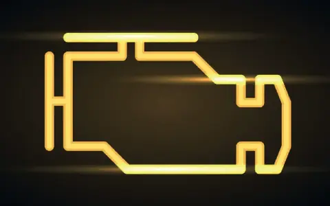 Icona gialla stilizzata di un motore. La spia motore accesa indica un problema, l'auto non accelera.