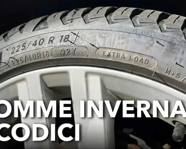 Gomme invernali per auto elettriche: dettaglio del battistrada con sigle M+S e fiocco di neve, per una guida sicura.