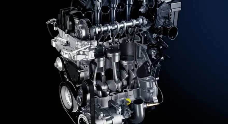Sezione di un motore auto moderno, con pistoni, albero motore e distribuzione visibili.