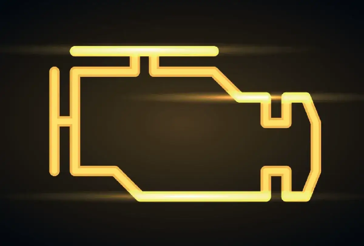 Spia motore accesa, forse un problema alla sonda lambda. Icona gialla luminosa su sfondo scuro.